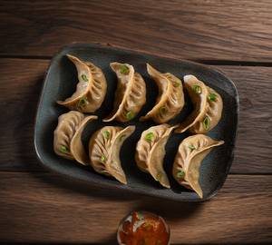Chicken Tikka Momos-8 Pcs ( Steamed )