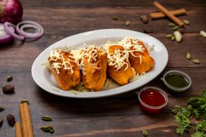 Stuffed Bread Pakoda (topped With Peri Peri & Cheese)