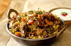 Hyderabadi Dum Biryani (served With Raita)