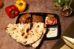 3 Slices Butter Naan With Chicken Masala