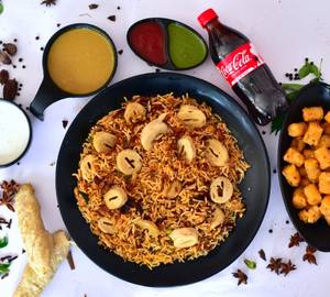 Royal Dum Soya Chaap Biryani + Garlic Shots + 250Ml Coke