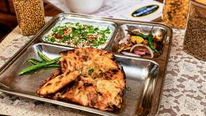 Amritsari Mix Paratha With Raita & Chuteny Pyaj (1 Pc.)