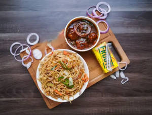Veg Chowmein + Veg Manchurian + French Fries + Frooti [125 ml]