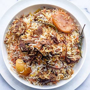Mutton 1 Pc  Dun  Biryani Egg Raita