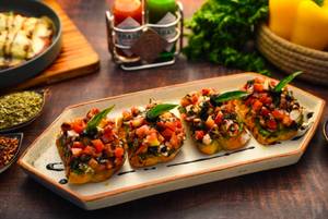 Tomato, Cheese And Black Olive Bruschetta