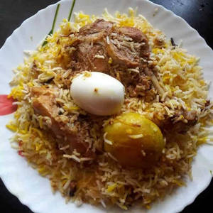 Chichen Dum  Briyani 1pc Chichen Egg Aalu Raita