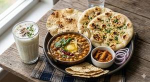 Chole Kulcha Combo/thali(2tandoori Kulch )+bt. Milk+papad+achar+onian