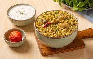 Gongura Chicken Annam Served With Fried Egg & Raitha