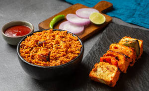 Paneer Tikka Masala Rice Served Withpaneer Tikka And Salad