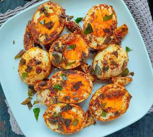 Fry Boiled Egg With Onion