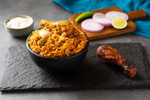 Kadai Chicken Rice Served With Tangdi Kebab And Salad