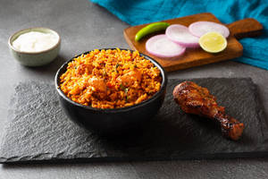 Chicken Tikka Masala Rice Served With Tangdi Kebab And Salad