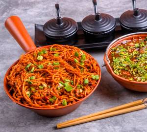 Schezwan Noodles With Manchurian Gravy