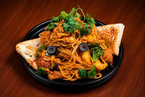 Penne Pasta In Marinara Sauce Served With Butter Bread