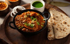 Chicken Curry (2Pcs) + 3 Tandoori Roti