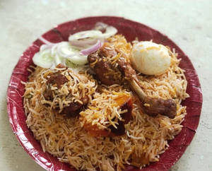 Chicken Dum Biryani 2pc Chichen 1aalu Egg Raita
