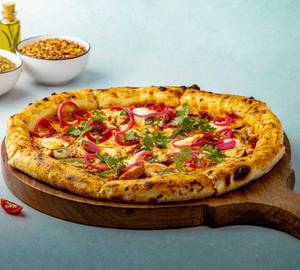 Chicken tikka overloaded pizza
