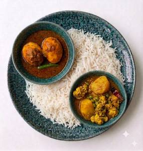 Basmati Rice In 500 ml , Egg Curry 1 Pc & Aloo Phoolkofi In 150 ml