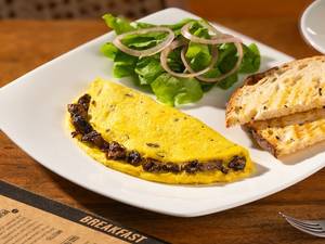 Sauteed Mushrooms And Emmenthal Omelette