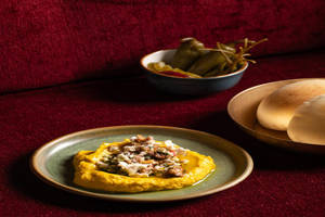 PUMPKIN HUMMUS (Served with our house-made puffed pita)