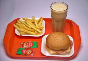 Chatpata Burger With Salted Fries And Chocolate Milkshake