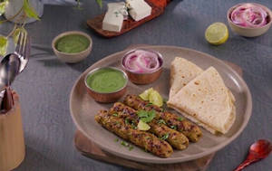 Chicken Seekh Kebab + 2 Rumali Roti + Chutney + Onion