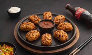 Paneer Tandoori Momos [8 Pieces] + Coke [200 Ml]