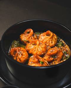 Veg Gravy Momos (06 Pieces)