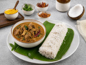 Puttu With Mutton Curry