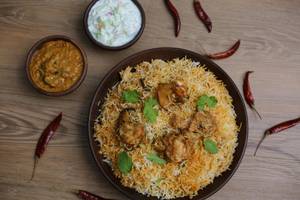 Half KG Chicken Biryani & Chicken 65[]