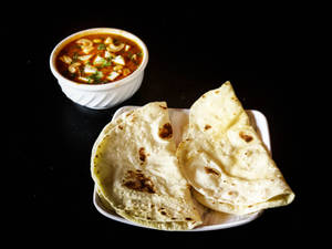 Paneer Butter Masala + Butter Naan 2pc