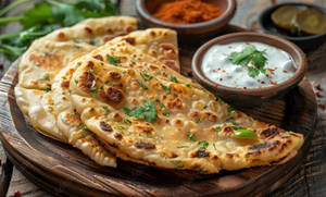 Aloo Paratha ( 2pcs) With Curd , Butter , Podina Chatney And Achar