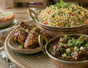 Egg Fried Rice + Veg Manchurian + Chicken Wings (4 Strips)