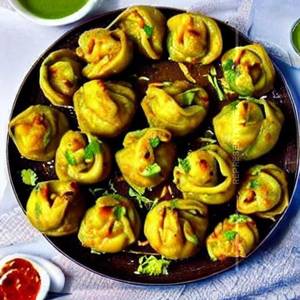 Delicious Veg Schezwan Tawa Fried Momos