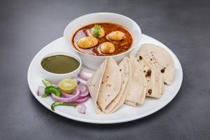 Egg curry 2 with 4 butter tawa roti