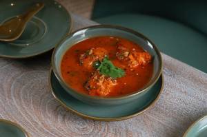 Tandoori Jhol Momos Soup