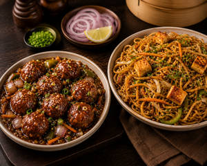 Veg Manchurian  & Paneer Chowmein(Serves 1 )