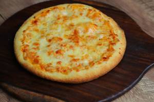 Single dieced cheese pizza