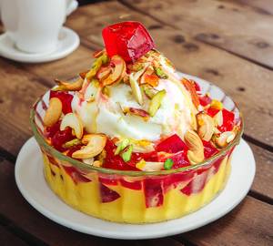 Fruit Salad Custard With Jelly Vanilla Ice Cream And Dry Fruits