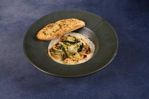 Chicken Ravioli Truffle Cream And Crispy Sage