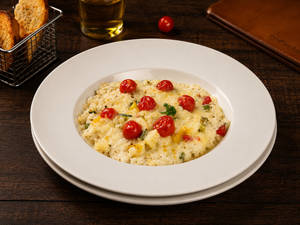 Baked Cheese Risotto with Vegetables and Cherry Tomato