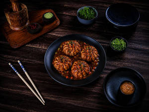 Schezwan Pepper Sauce Veg Momo