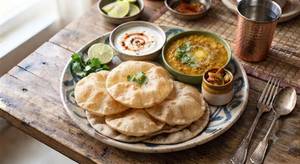 4 Poori With Dal Fried [198 ml]