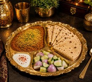 Sev Bhaji,curd.salad,thali 