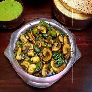 Veg Mushroom Schezwan Dry