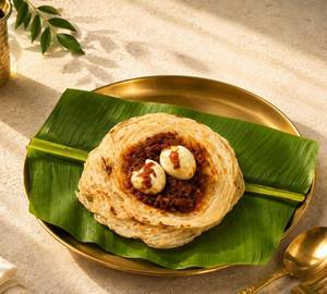 Egg Roast Kizhi Parotta