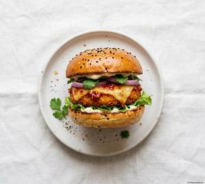 Schezwan Aloo Tikki Mayo Burger