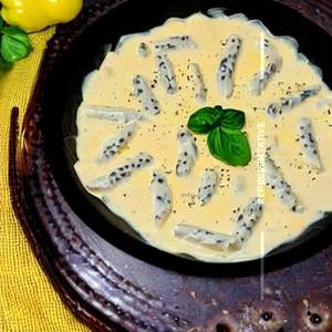 Cream Cheese & Chicken Ravioli In Yellow Pepper Cream Sauce