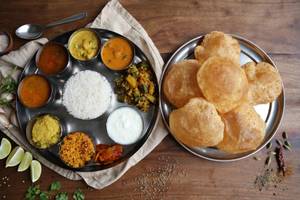 Rice Unlimited, 6 Poori, 2 Veg, Sambar, Korma, Rasam, Curd, Sweet (As Per Availibility), Pap, pa