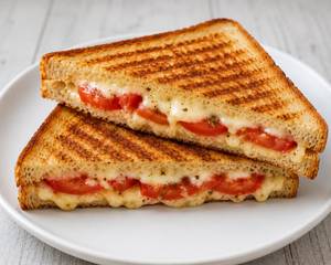 Onion Capsicum Tomato And Cheese Sandwich